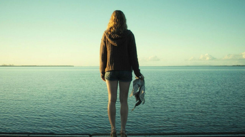 Jess looking out over the ocean in "Triangle."