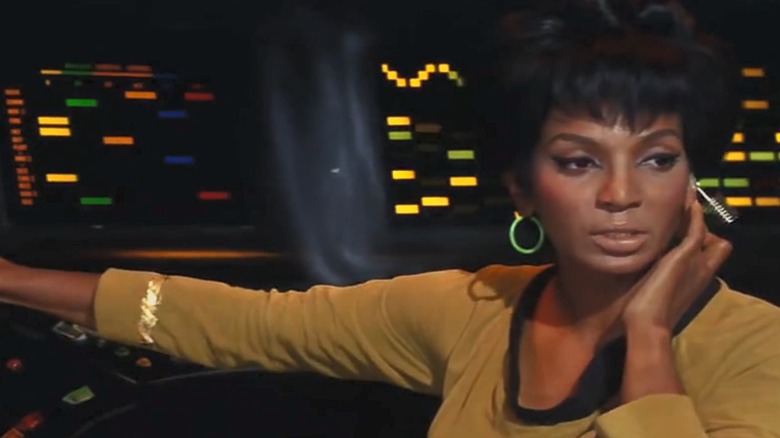 Nichelle Nichols as Uhura with earpiece in Star Trek
