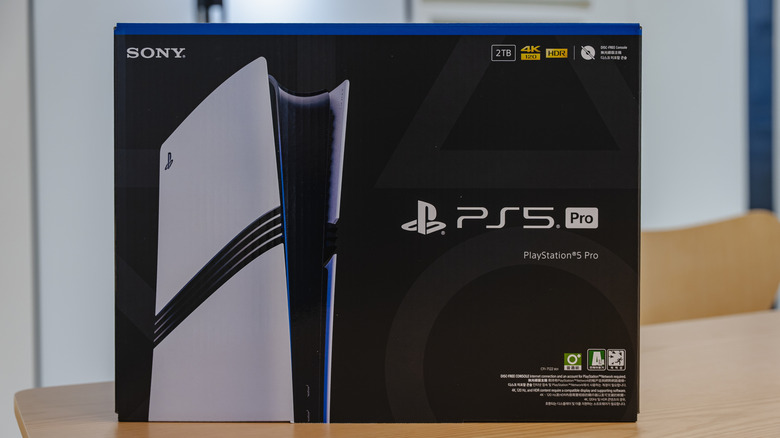 playstation 5 pro console box placed on a wooden table