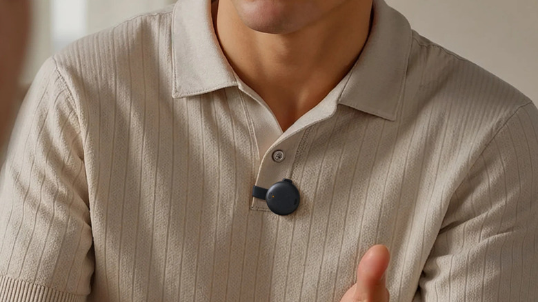 Man wearing Soundcore Work attached to his shirt