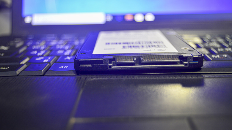 SSD drive on top of a laptop keyboard