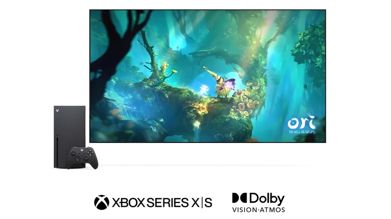 A promotional image showing gameplay of Ori and the Will of the Wisps alongside an Xbox Series X with the Dolby Vision and Atmos logo on a white background.