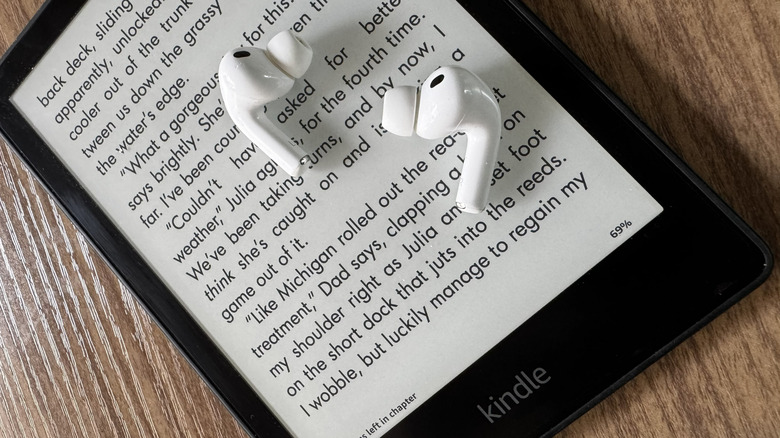 AirPods Pro on top of Kindle