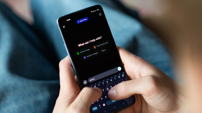 person typing a question into the chatgpt mobile app