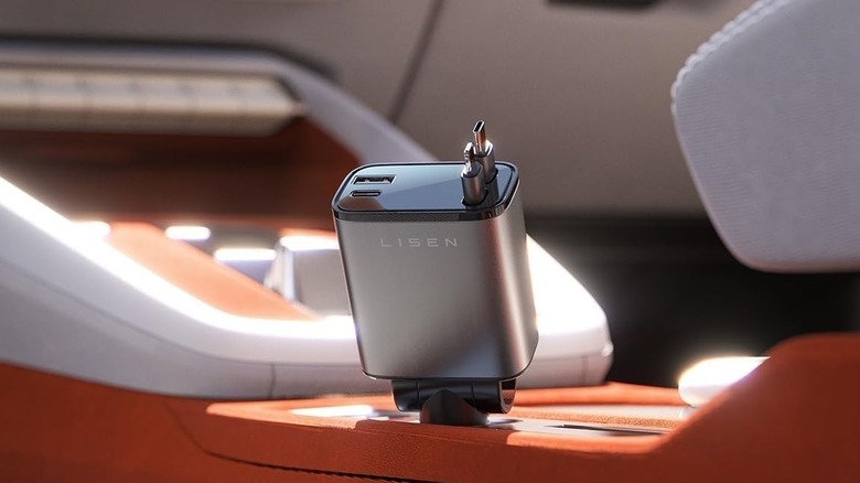 The Lisen Retractable Car Charger plugged into the 12V port of a car's center console.