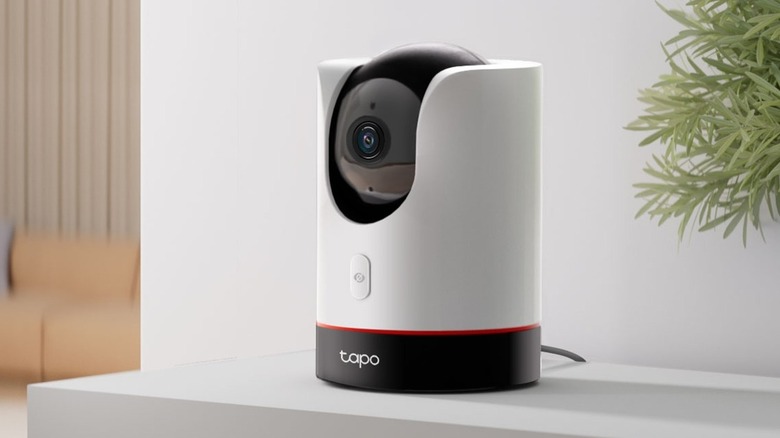 The Tapo C225 placed on a white surface in a home setting
