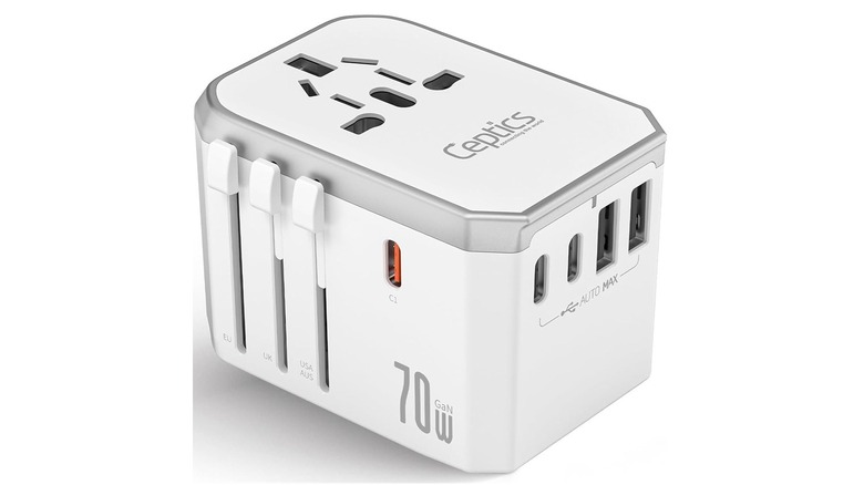 The Ceptics 6-in-1 Universal Travel Adapter on a white background, showing its ports and controls.