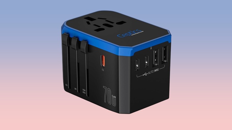 The Ceptics UP-70KU Universal Travel Adapter against a gradient background