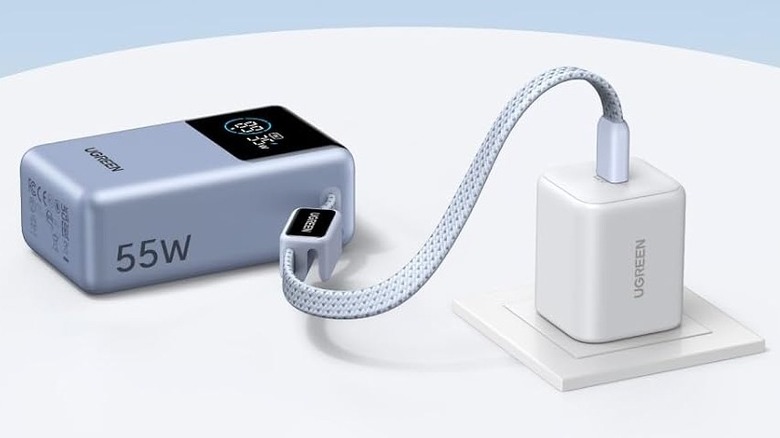 Close-up of Ugreen Nexode Pro 10,000 mAh 45 W Mini Power Bank being charged via a power adapter