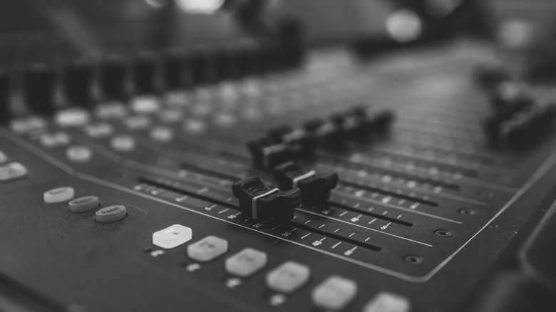 Equalizer switches on an audio mixing console.