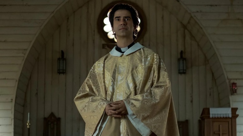 Father Paul Hill (Hamish Linklater) in church in Midnight Mass