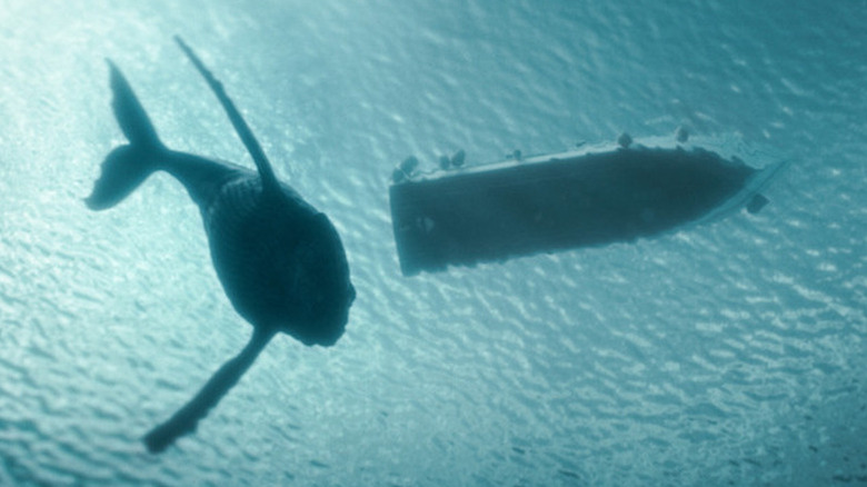 A whale swimming toward a boat in "The Swarm."