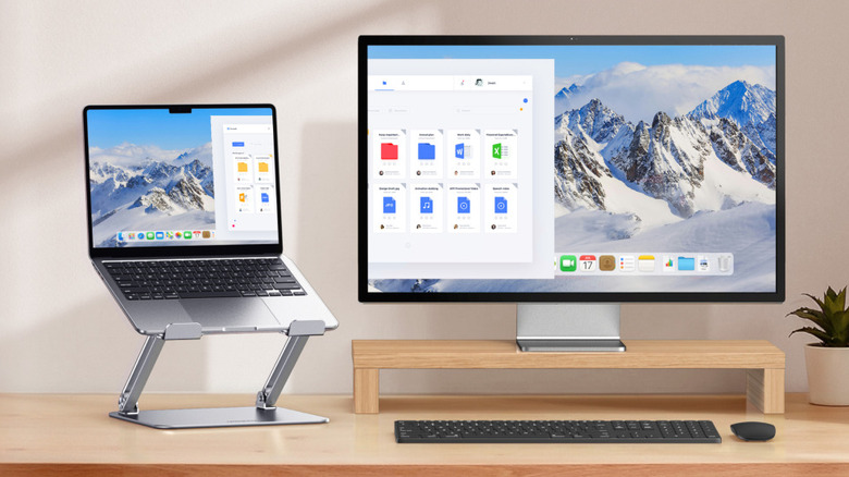 A MacBook on the Ugreen Portable Laptop Stand for Desk