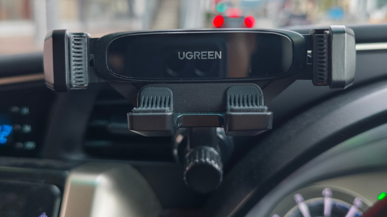 Close-up of a UGREEN mount installed in a car