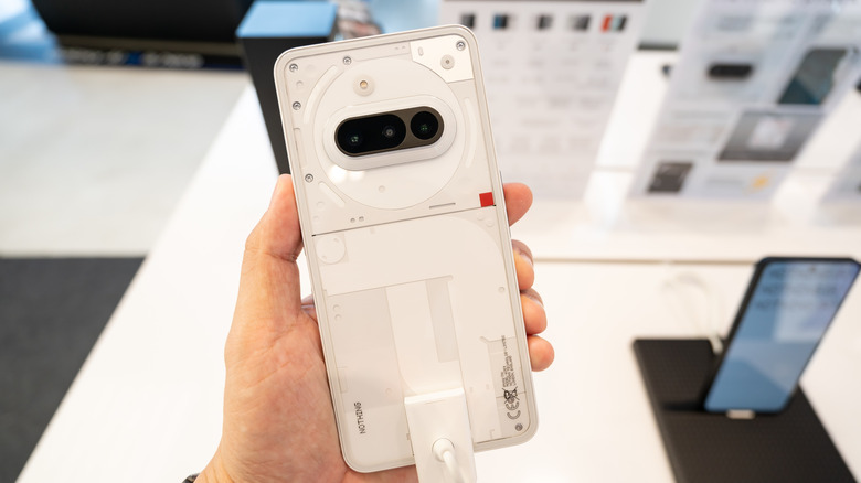 Person holding a Nothing phone
