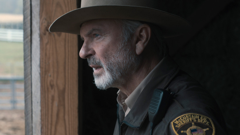 Jim Bell Tyson looking out a window in "Invasion."
