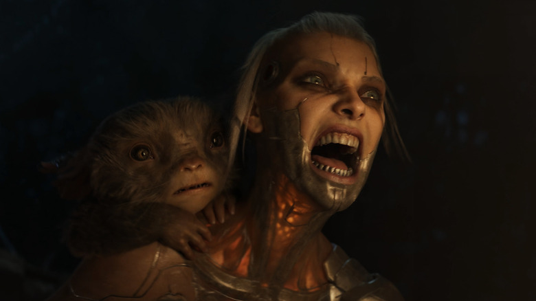 An alien on a woman's back who is screaming in Love, Death & Robots