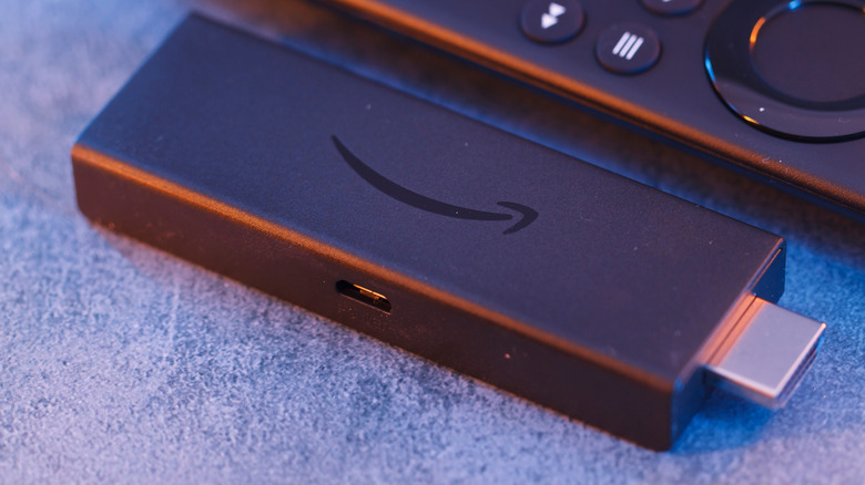Amazon Fire TV stick and its remote controller