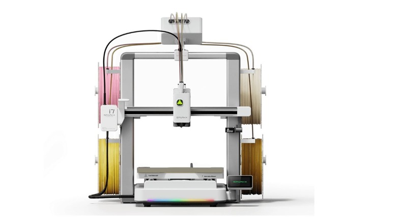 Creality SPARKX i7 3D printer with multicolor filament spools on a white background.