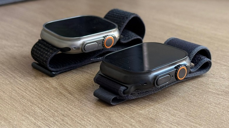 Two Apple Watch Ultra 2 models on a table