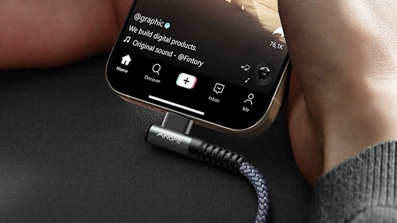 A closeup of the Ainope USB-C to USB-C cable charging a smartphone