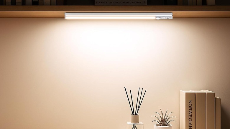 Gritin 10.2inch Under-Cabinet Lighting used under the wall-mounted cabinet
