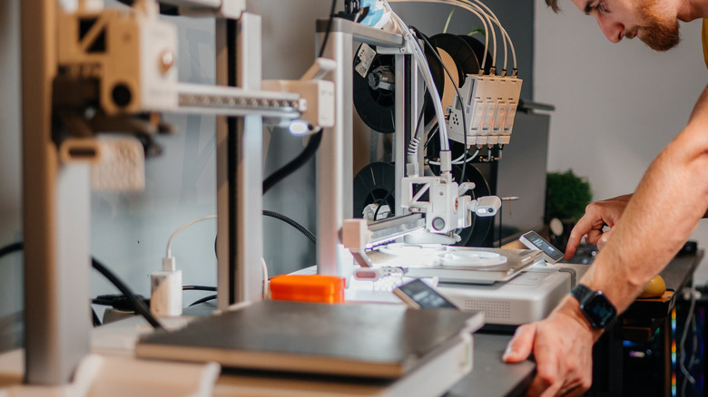 R2D2-themed housing for Google Home Mini (Left) and Echo Dot 4 Gen 4 and 5 (Right) on a black background