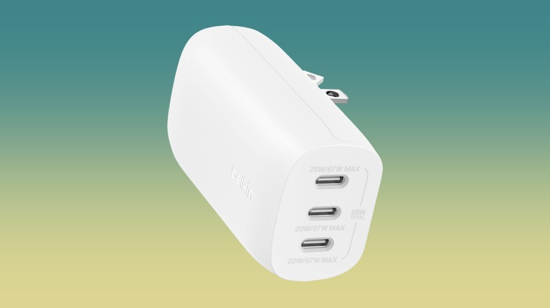 The Belkin BoostCharge 3 Port 67W USB-C Wall Charger against a gradient background