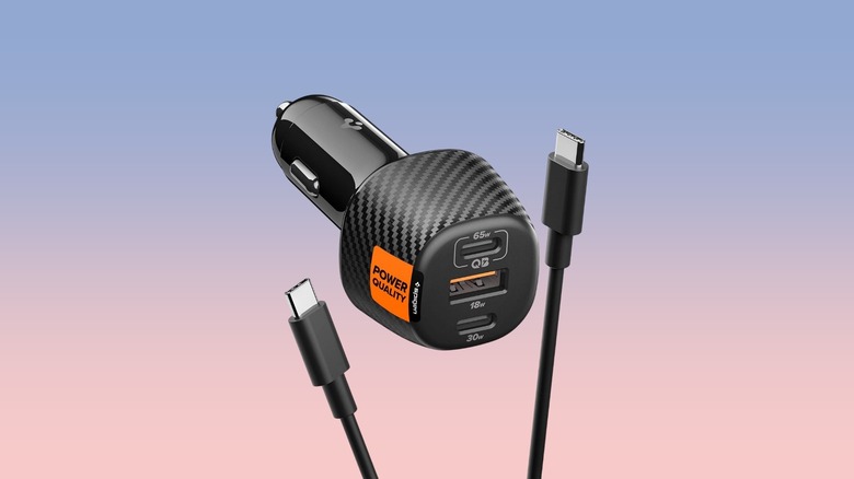 The Spigen ArcStation Essential USB-C Fast Car Charger against a gradient background with a USB cable