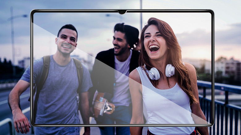 Three people laughing displayed on a Samsung Galaxy Tab with a Sparin screen protector.
