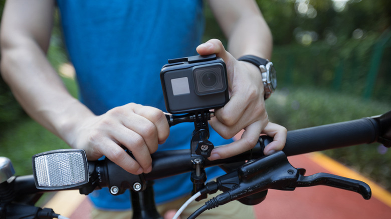 GoPro camera mounted to the handlebars of a bike