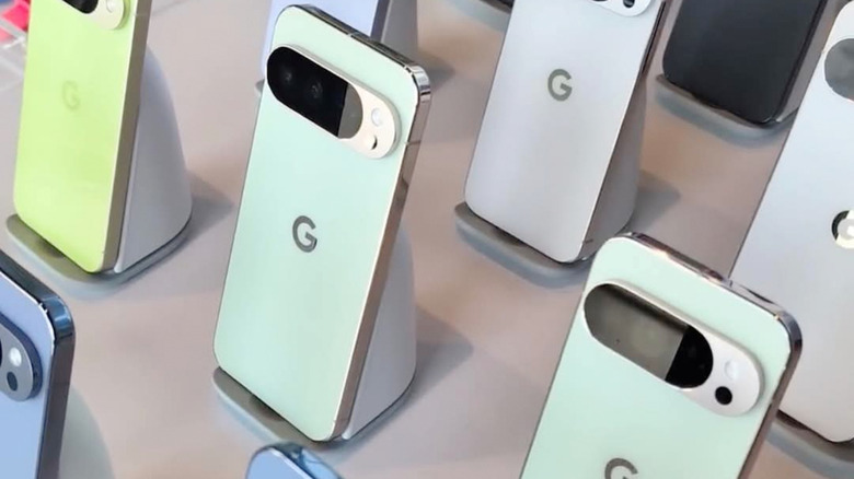 Google Pixel 9 Pro smartphones arranged in a store