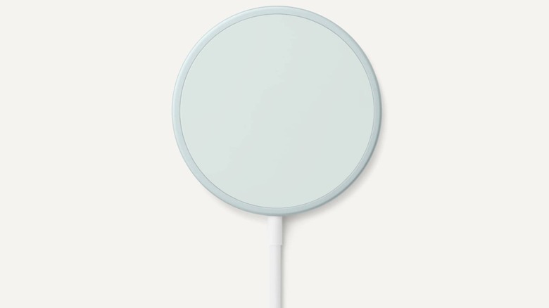 The Google Pixelsnap Charger against a greyish-yellow background