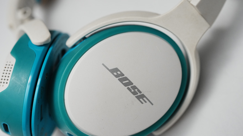 Side-view of Bose headphones missing cushion on earpad.