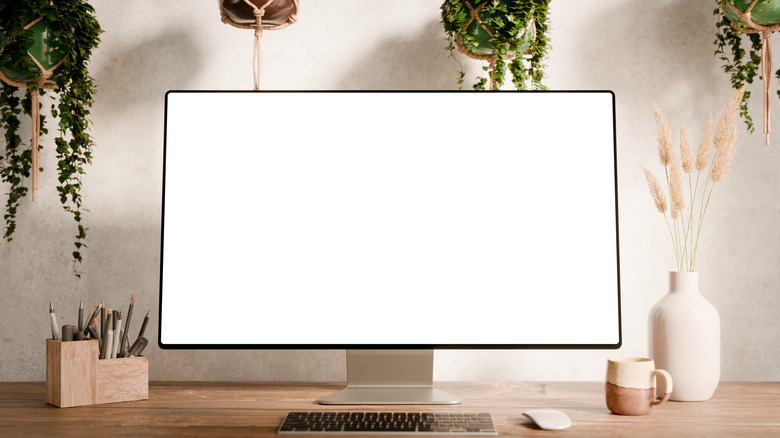 A computer monitor with a bright, white screen.