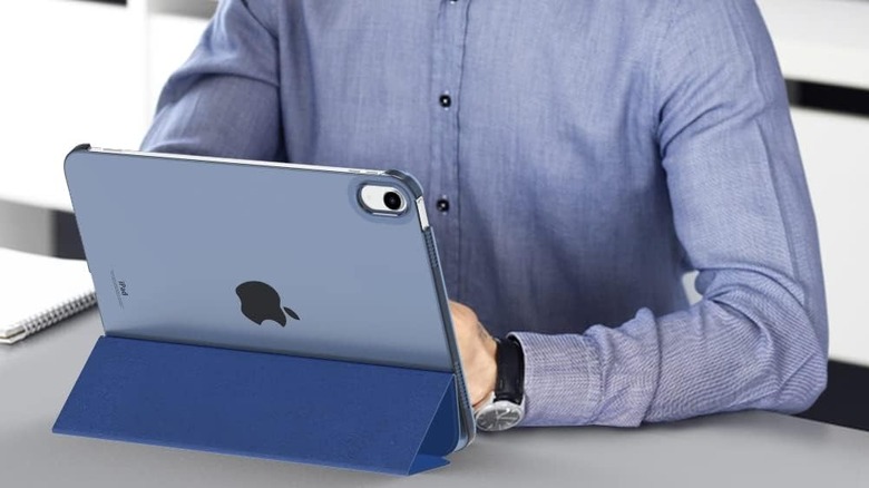 Close up of an iPad in a blue case folded to serve as a stand