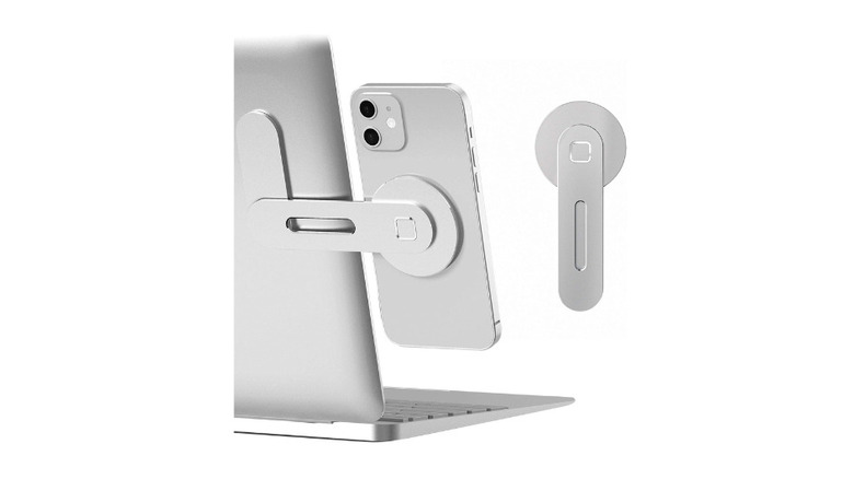 an image showing the CloudValley Magnetic Phone Holder attached to the back of a laptop and holding a phone