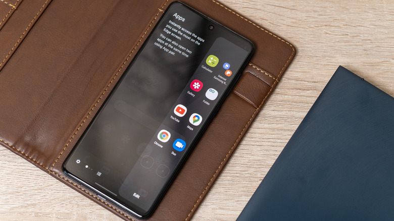 The Samsung Galaxy A71 Android smartphone in a case