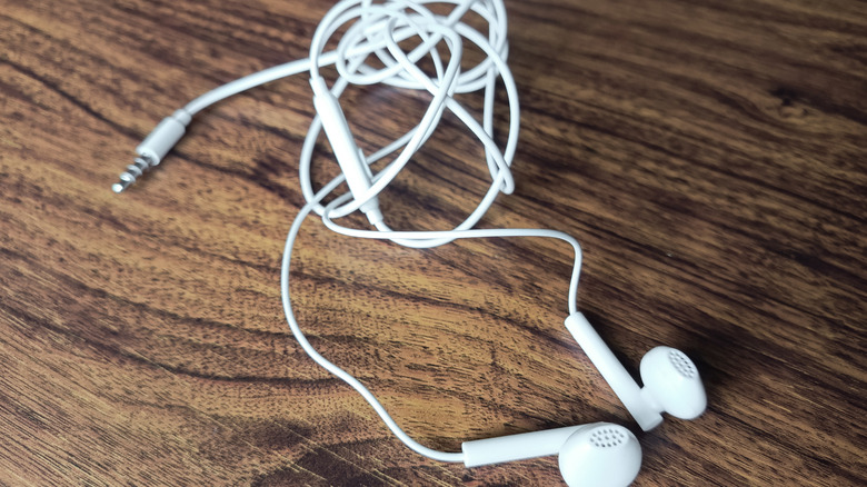 Tangled-up wired earphones.