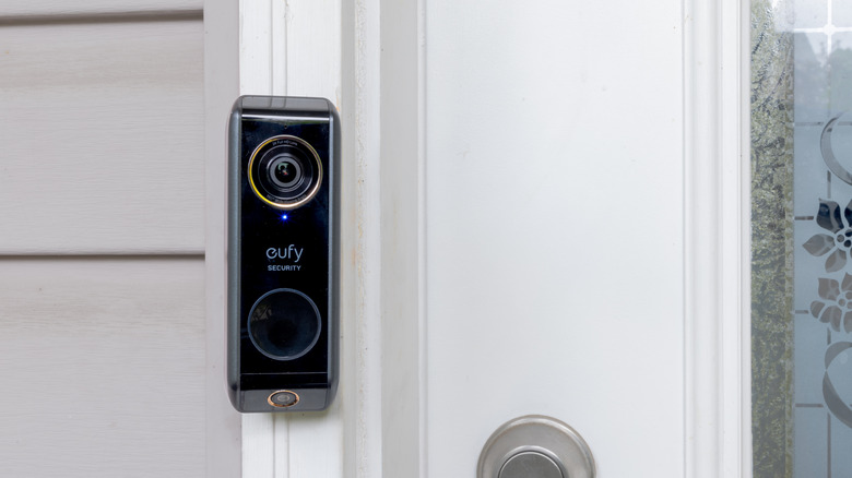 An Eufy video doorbell mounted on the facade of a home