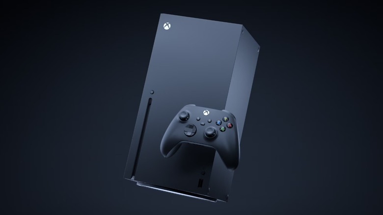 The Xbox Series X (1TB) gaming console with its controller on a dark background.