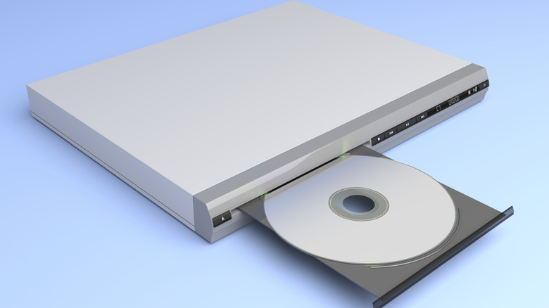 An image of a DVD player with its tray out, holding a disc on a blue background.