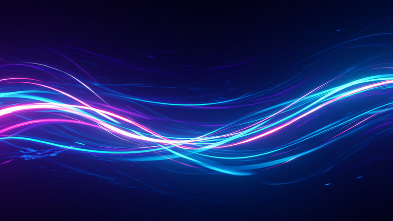 Stylized ultraviolet light rays on a dark background