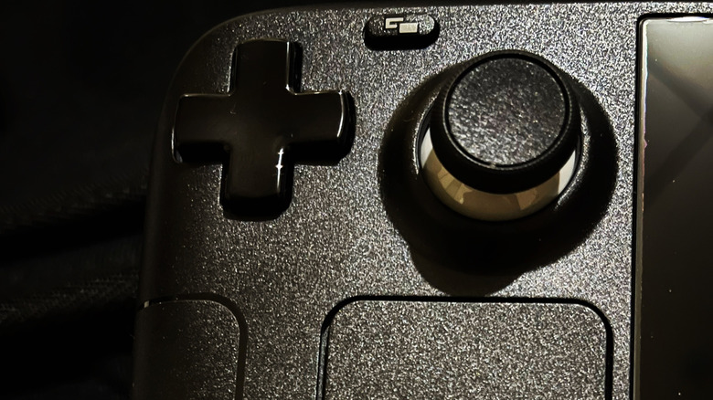 Close up of Steam Deck left hand side on a black background