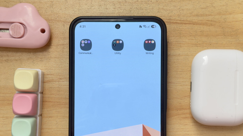 Android phone showing app folders in the home screen
