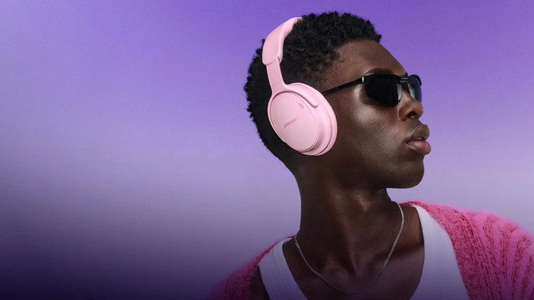 Someone wearing Sky Pink 2nd Gen Bose QuietComfort Headphones.