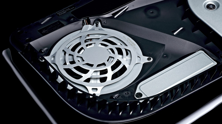 PlayStation 5 console fan visible with case open.