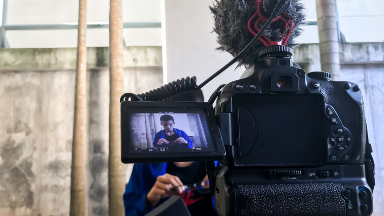 A camera with the viewfinder display showing an ongoing shoot