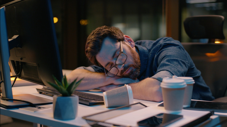 Man asleep at the computer