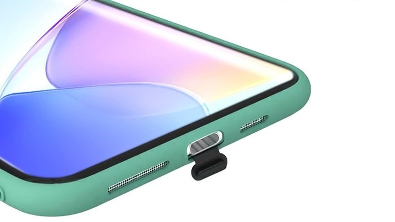 USB-C Dust Plug attached to a smartphone